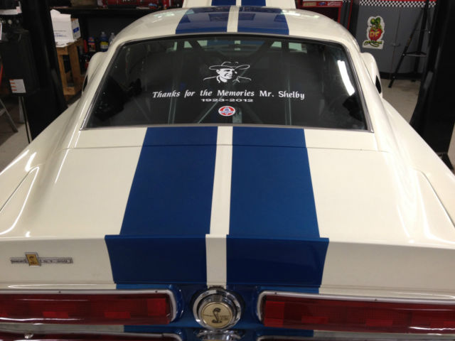 1967 white w/blue stripes Ford Mustang