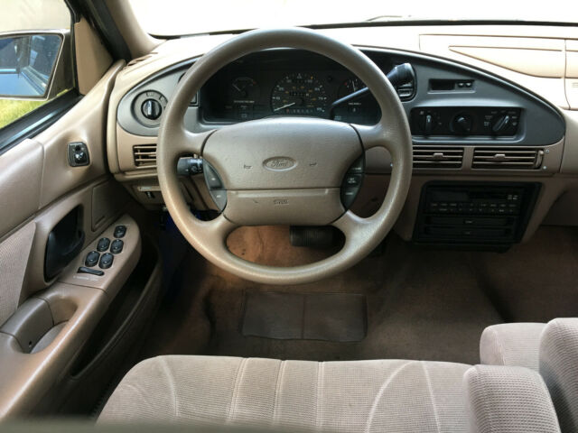 1994 Champagne Beige Ford Taurus Sedan