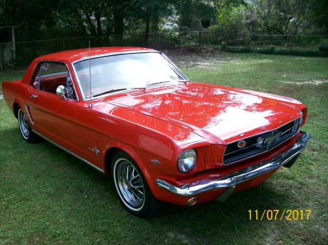 1965 red Ford Mustang