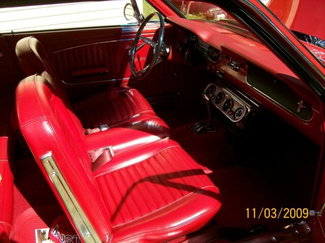 1965 red Ford Mustang