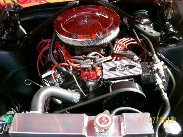 1965 red Ford Mustang