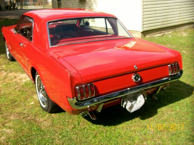 1965 red Ford Mustang