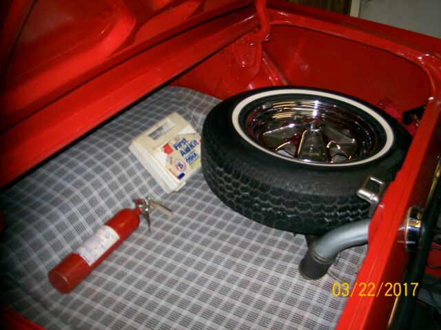 1965 red Ford Mustang