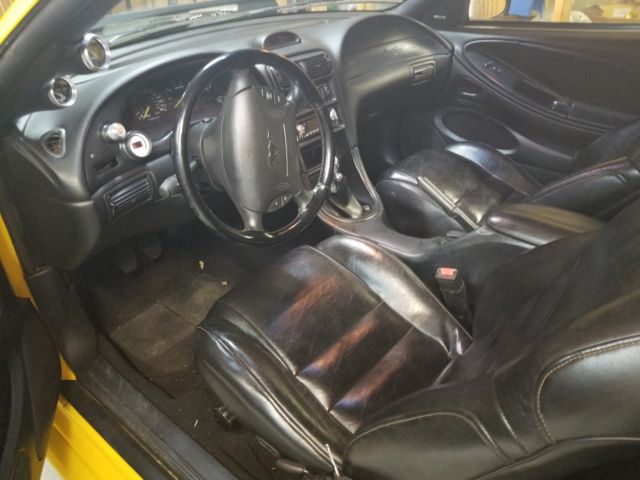 1994 Yellow Ford Mustang Convertible