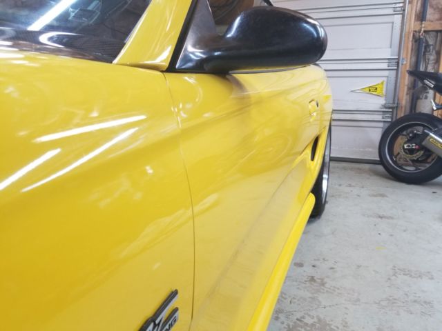1994 Yellow Ford Mustang Convertible