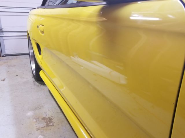 1994 Yellow Ford Mustang Convertible