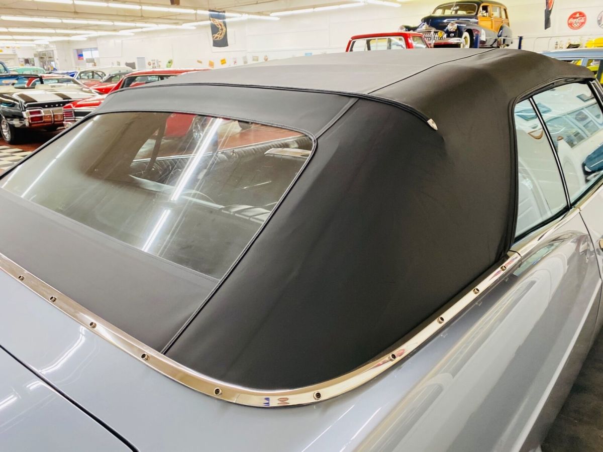 1965 Silver Chevrolet Impala Convertible