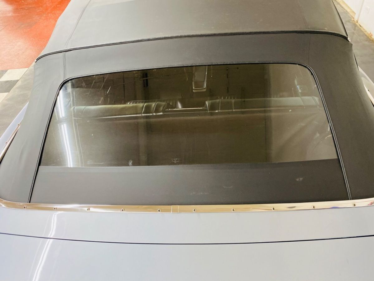 1965 Silver Chevrolet Impala Convertible