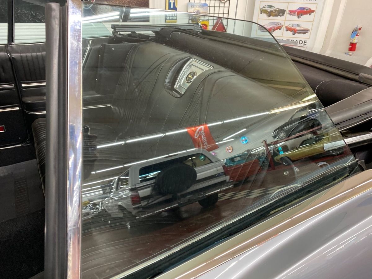 1965 Silver Chevrolet Impala Convertible