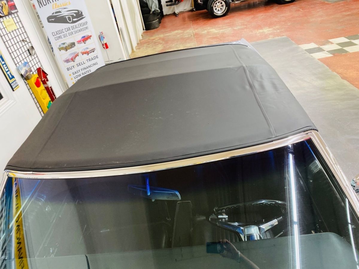 1965 Silver Chevrolet Impala Convertible