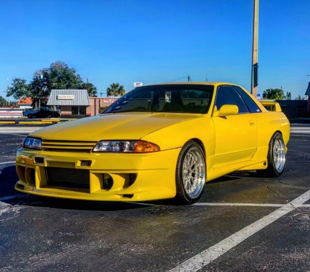 1991 Carnival yellow Nissan GT-R Coupe