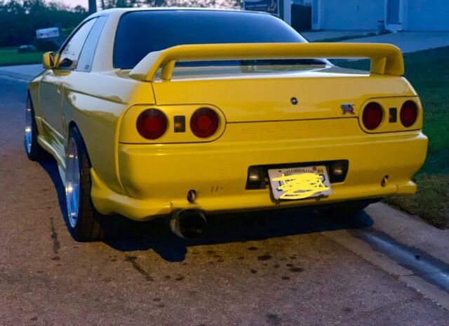 1991 Carnival yellow Nissan GT-R Coupe