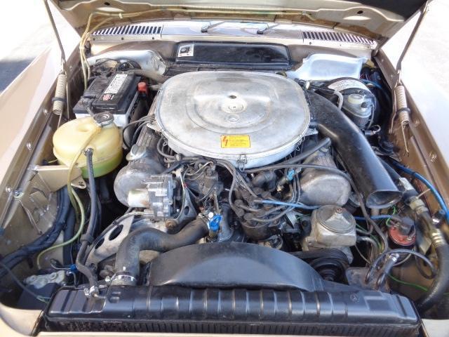 1985 Gold Mercedes-Benz 500-Series Convertible