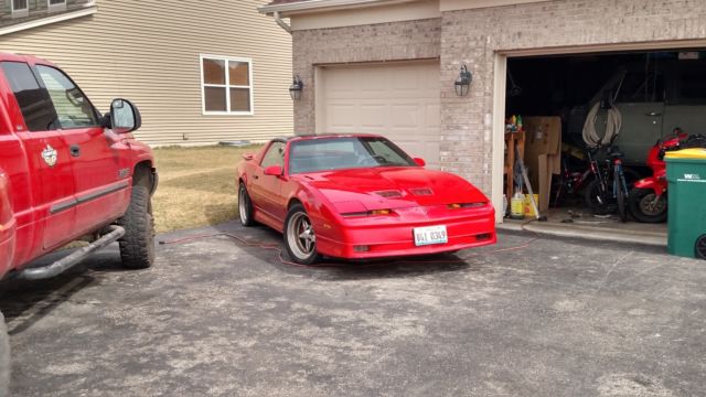 1989 Red Pontiac Firebird Hatchback