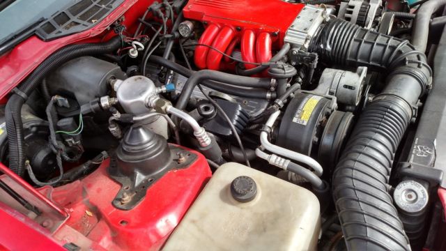 1989 Red Pontiac Firebird Hatchback