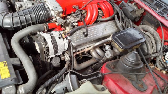 1989 Red Pontiac Firebird Hatchback