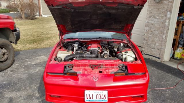 1989 Red Pontiac Firebird Hatchback