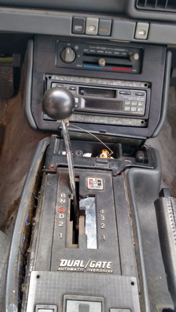 1989 Red Pontiac Firebird Hatchback