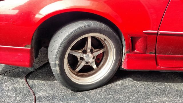 1989 Red Pontiac Firebird Hatchback
