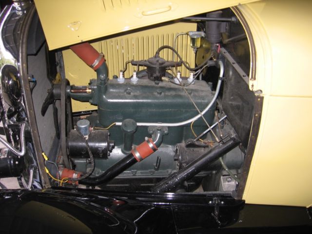 1928 Yellow Ford Model A Coupe