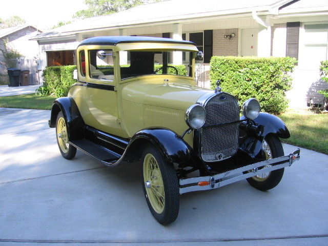 1928 Yellow Ford Model A Coupe