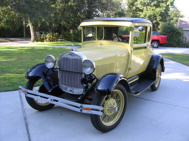 1928 Yellow Ford Model A Coupe