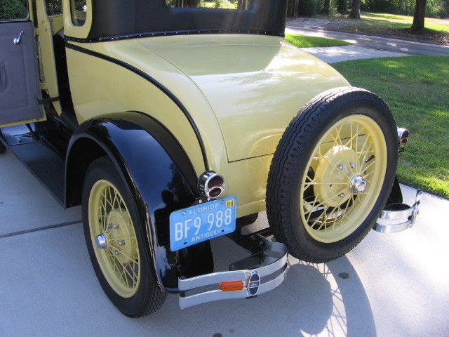 1928 Yellow Ford Model A Coupe
