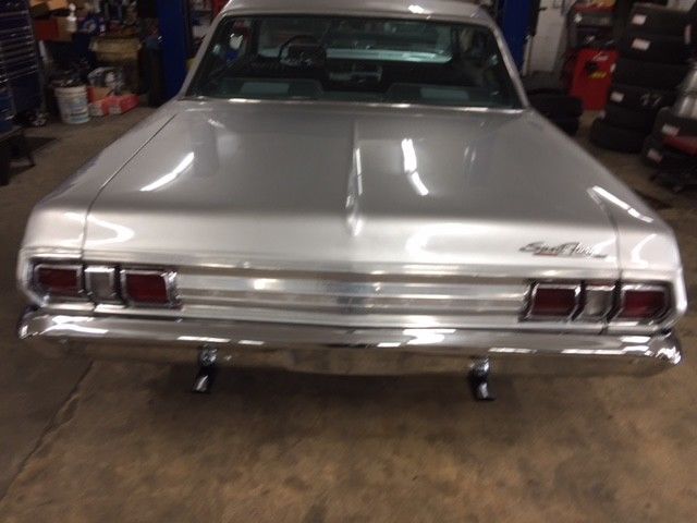 1965 Silver Plymouth Fury Coupe