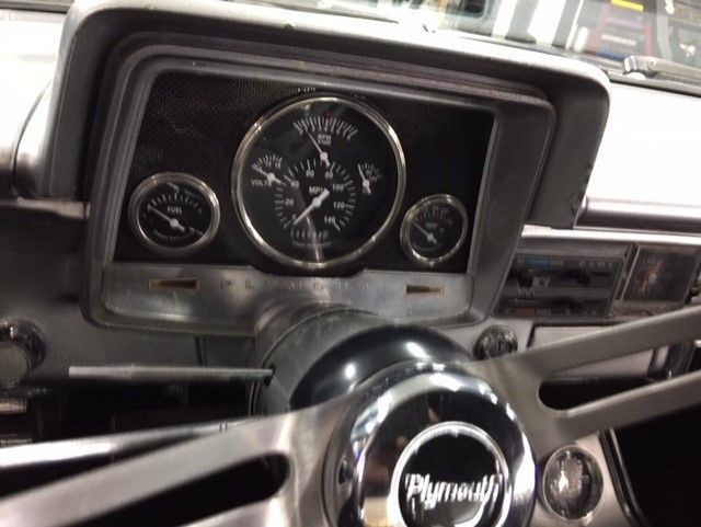 1965 Silver Plymouth Fury Coupe