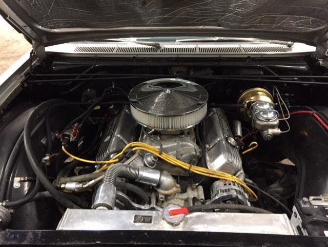 1965 Silver Plymouth Fury Coupe