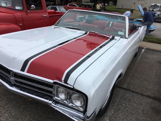 1965 White w/ Red Stripe Oldsmobile Starfire Convertible
