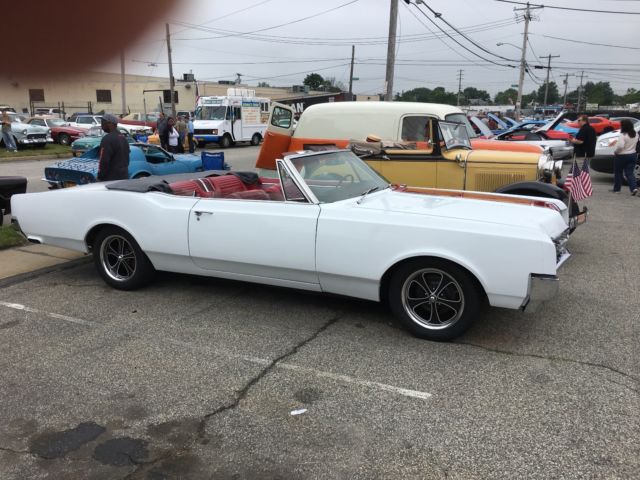 1965 White w/ Red Stripe Oldsmobile Starfire Convertible
