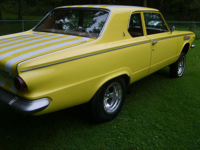 1964 yellow with ram charger stripes Dodge Dart 2 door sedan