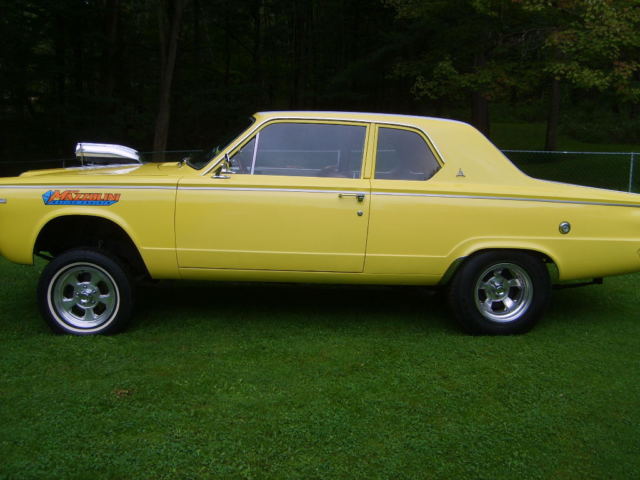 1964 yellow with ram charger stripes Dodge Dart 2 door sedan