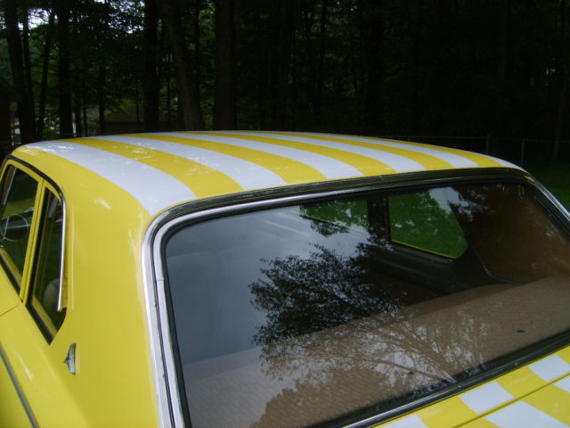 1964 yellow with ram charger stripes Dodge Dart 2 door sedan