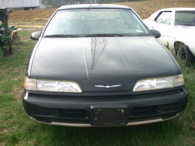1990 Black Ford Thunderbird 2 door
