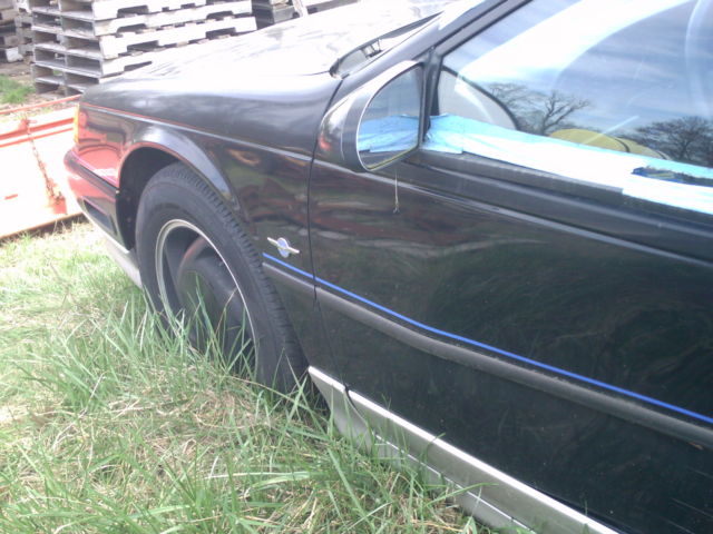 1990 Black Ford Thunderbird 2 door