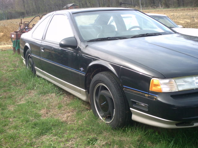 1990 Black Ford Thunderbird 2 door