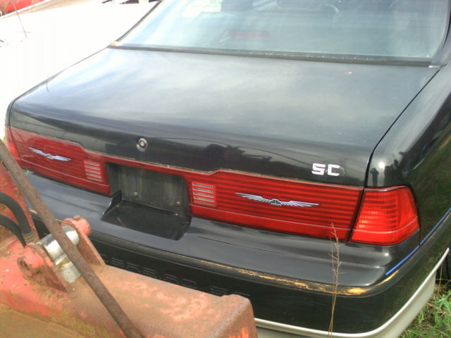 1990 Black Ford Thunderbird 2 door