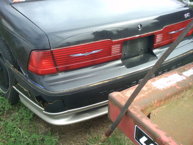 1990 Black Ford Thunderbird 2 door