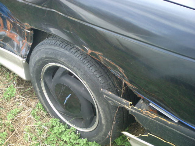 1990 Black Ford Thunderbird 2 door
