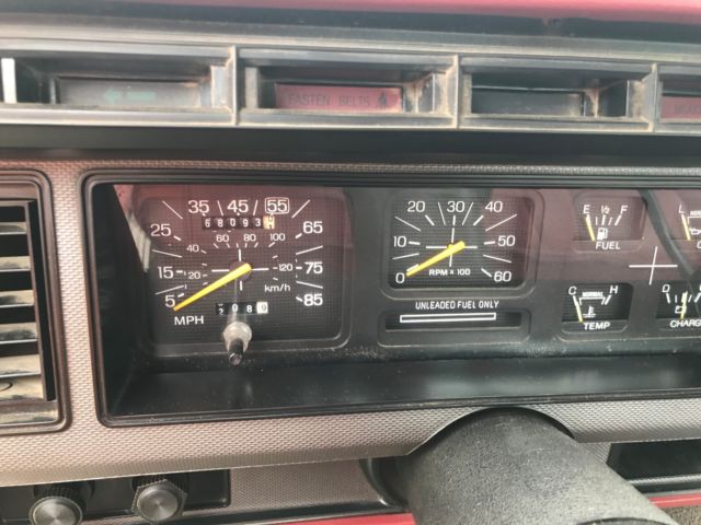 1986 Red and White Ford F-150 Standard Cab Pickup