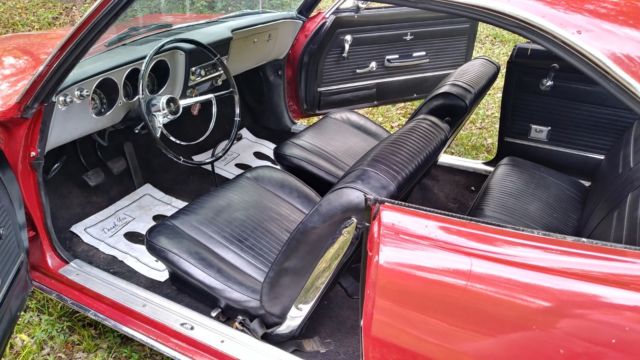 1965 Red Chevrolet Corvair Coupe