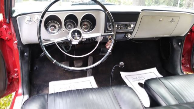 1965 Red Chevrolet Corvair Coupe