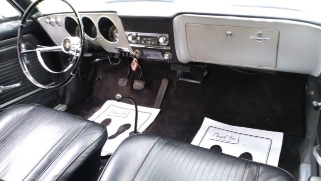 1965 Red Chevrolet Corvair Coupe