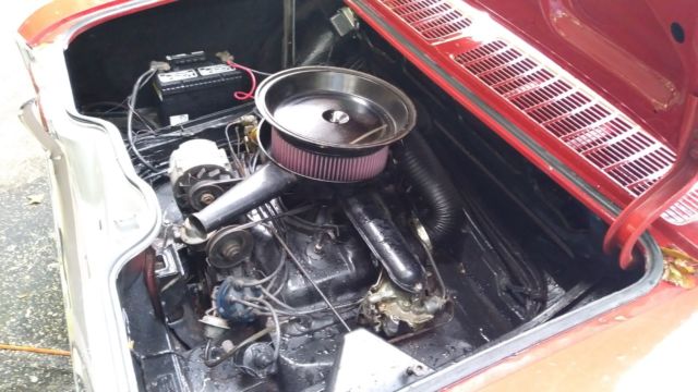 1965 Red Chevrolet Corvair Coupe