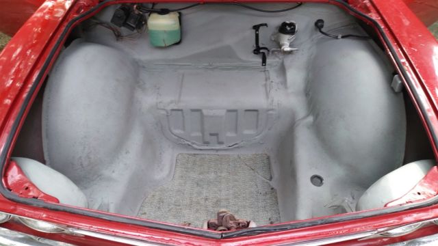 1965 Red Chevrolet Corvair Coupe