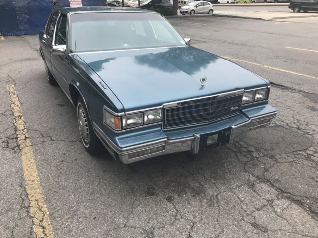 1986 Blue Cadillac DeVille Sedan