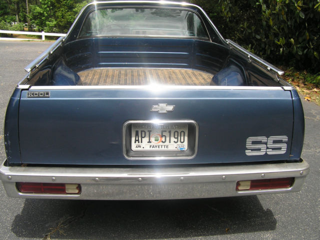 1985 dark blue over light blue Chevrolet El Camino