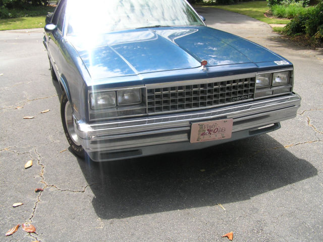 1985 dark blue over light blue Chevrolet El Camino